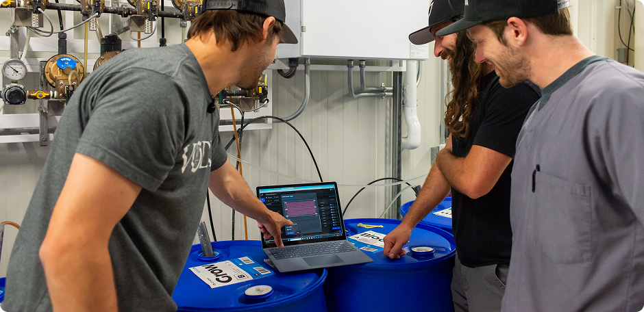 Growlink team installing equipment at a cultivation facility