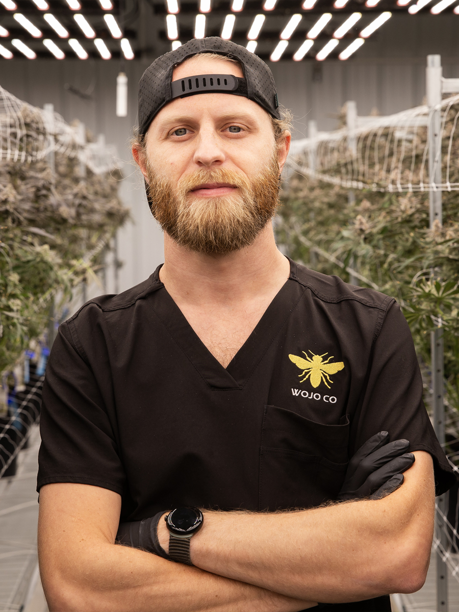 Commercial cultivator in a Growlink-equipped grow room